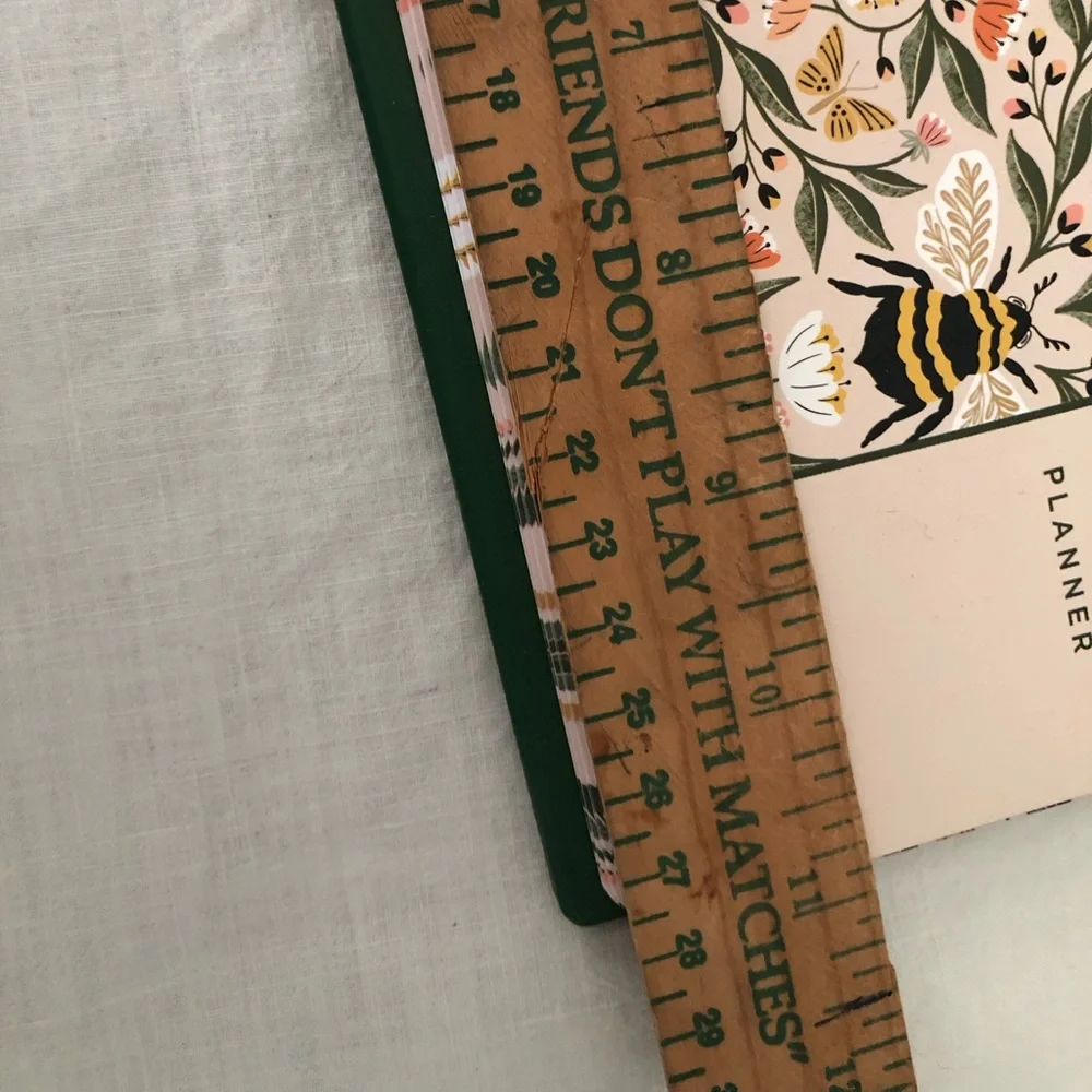 Juliana Tipton x Fringe weekly desktop planner featuring a bee and botanical pat